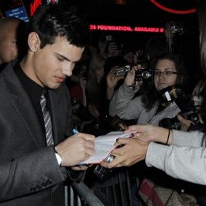 Taylor Lautner meets fans at the premiere of Valentine's Day
