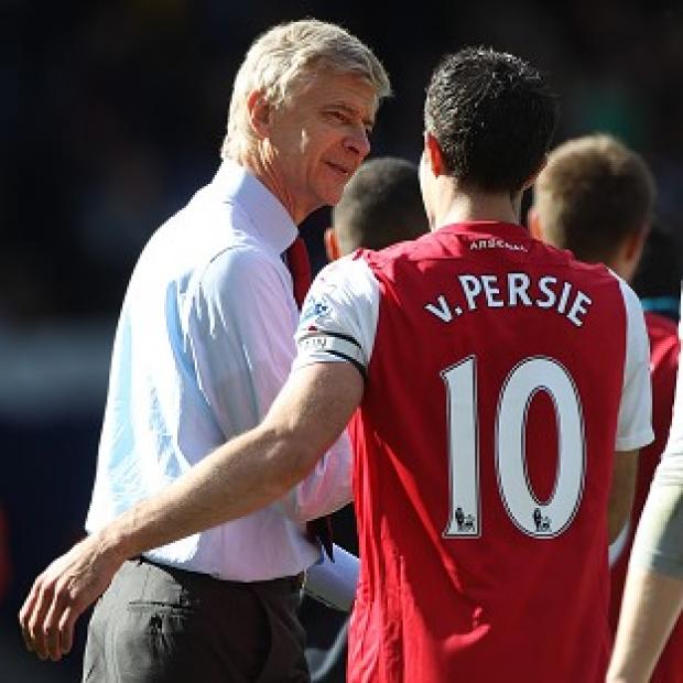 Congleton Guardian: Arsene Wenger, left, claims Robin van Persie is a 'world-class striker' Congleton Guardian: Arsene Wenger, left, claims Robin van Persie is a 'world-class striker'