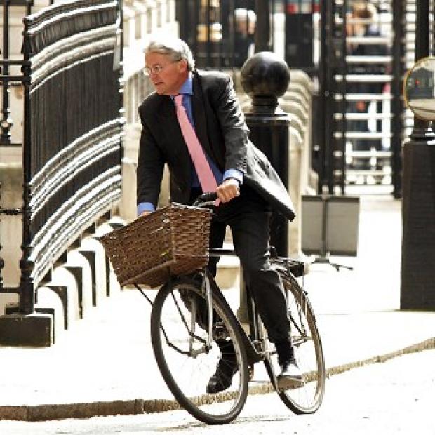 Tory Chief Whip Andrew Mitchell denies using the words he is reported as saying