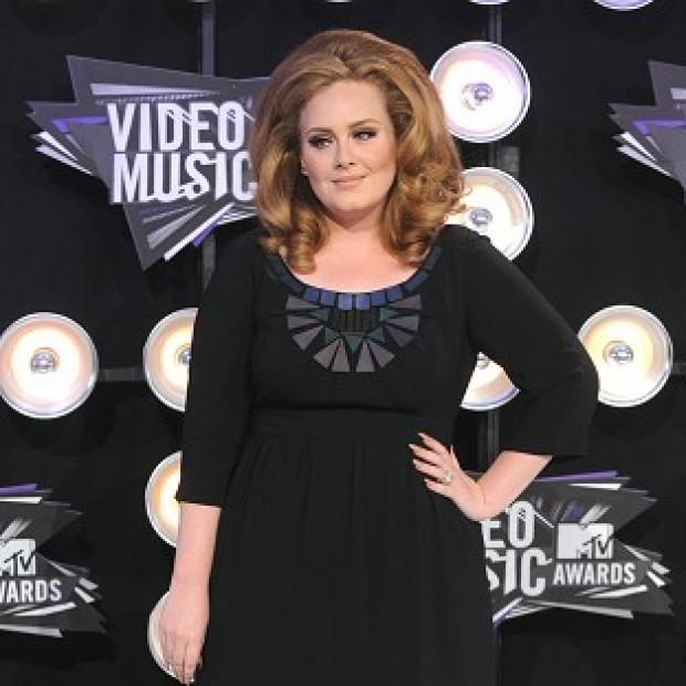 Adele will sing the theme for the new 007 flick