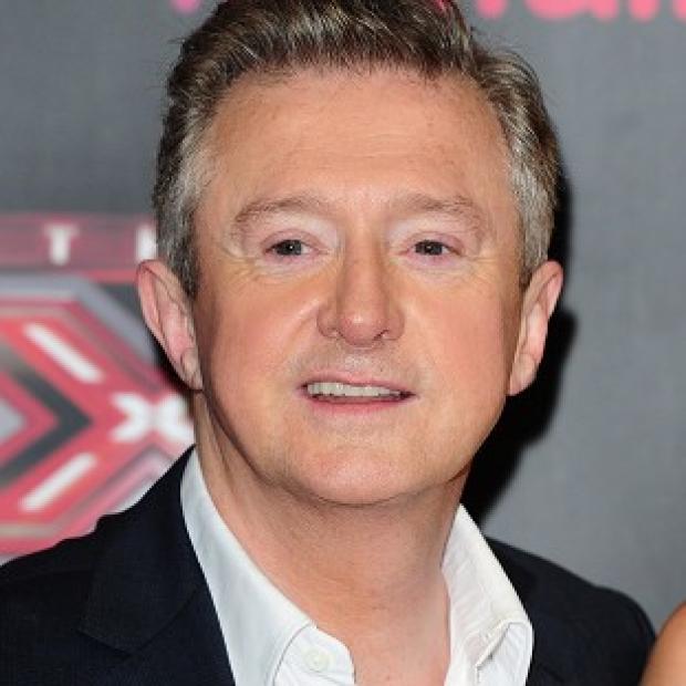 X Factor producer Richard Holloway was seen talking to Louis Walsh during Sunday night's show