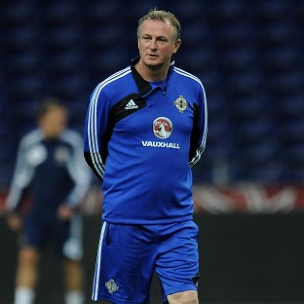 Michael O'Neill's Northern Ireland side held Portugal to a 1-1 draw in Lisbon