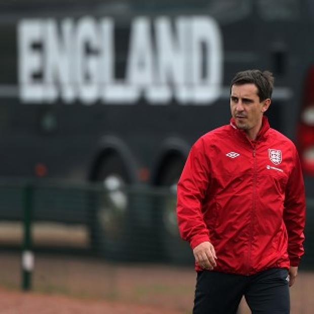 Gary Neville, pictured, has been criticised by Carlos Tevez