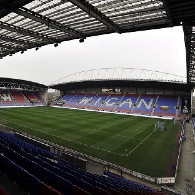 Wigan have signed teenage Manchester United striker Angelo Henriquez on loan