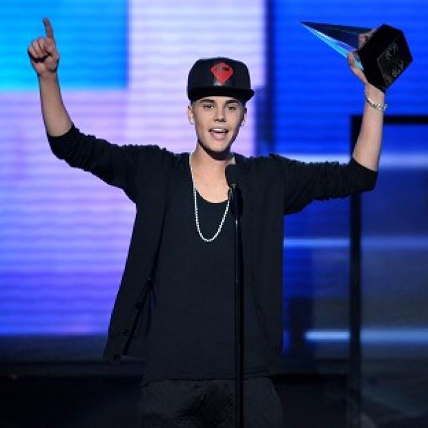 Justin Bieber issued a statement after the death of a photographer who took pictures of the pop star's car
