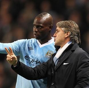 Roberto Mancini, right, and Mario Balotelli, left, were involved in a training ground confrontation