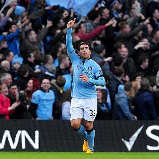 Carlos Tevez netted Manchester City's opener against Watford