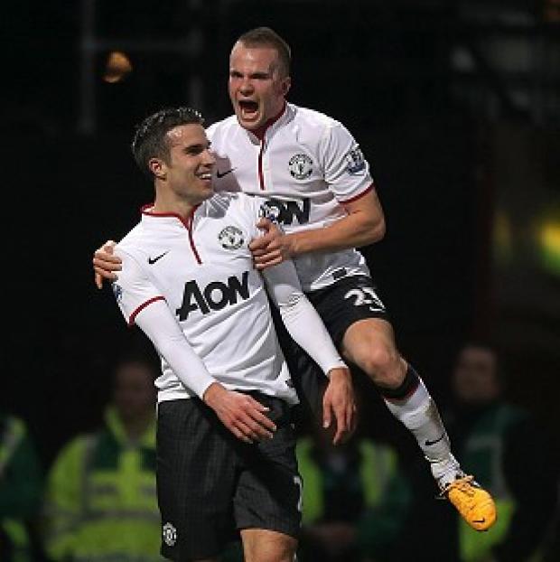 Robin van Persie, left, netted a late equaliser at West Ham to earn Manchester United a replay
