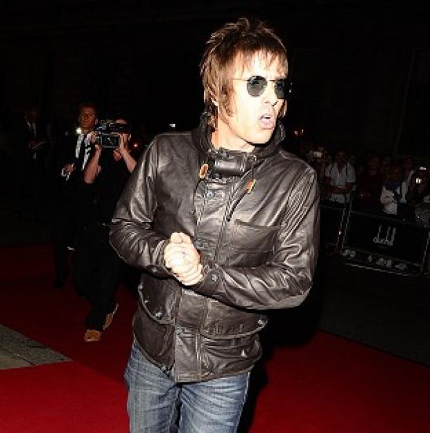 Liam Gallagher says the new Beady Eye album will feature a brass band