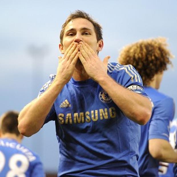 Frank Lampard celebrates scoring Chelsea's third goal