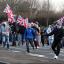 Loyalists react after being attacked by nationalists throwing stones from the nationalist Short Strand area of Belfast