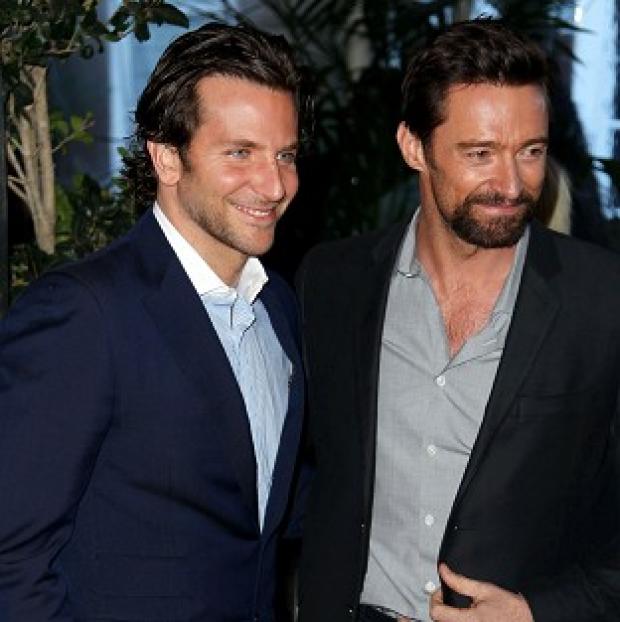Bradley Cooper, left, and Hugh Jackman at the Bafta Awards Season Tea Party in Los Angeles (Matt Sayles/Invision/AP)
