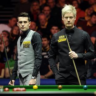 Mark Selby, left, was made to work for his third Masters title by Neil Robertson, right