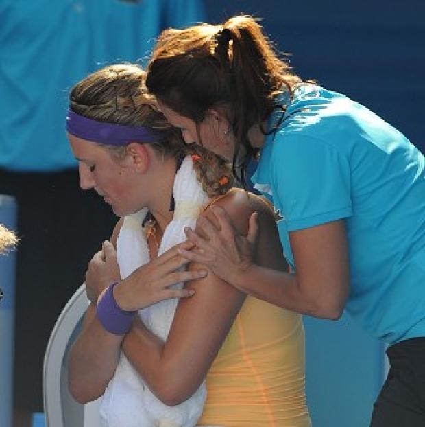 Victoria Azarenka receives treatment during the Australian Open semi-final (AP)