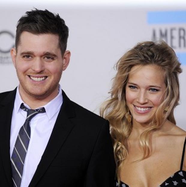 Michael Buble, left, and Luisana Lopilato
