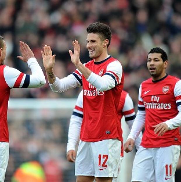 Olivier Giroud, centre, opened the scoring for Arsenal against FA Cup opponents Brighton
