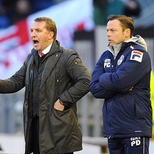 Brendan Rodgers, left, felt his youngsters did not do themselves justice