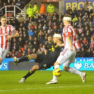 Franco Di Santo, centre, scored Wigan's equaliser at Stoke