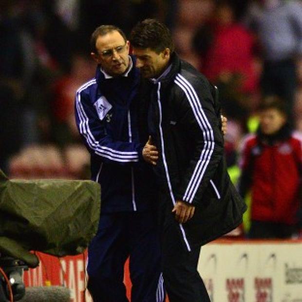 Martin O'Neill, left, and Michael Laudrup saw their sides share the spoils