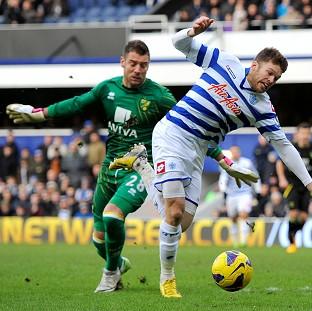 Mark Bunn, left, brought down Jamie Mackie and then saved the resulting penalty