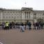A scenes of crime officer documents evidence between the Queen Victoria Memorial and Buckingham Palace where police subdued a suspect