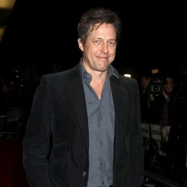 Hugh Grant attended the gala screening of Cloud Atlas in London