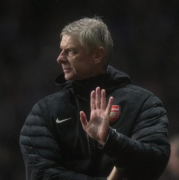 Arsene Wenger has urged Arsenal to show a united front despite recent results