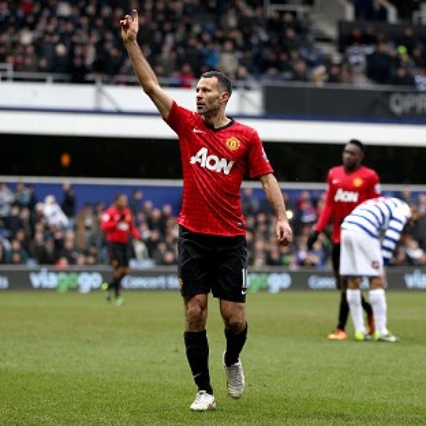 Rafael and Ryan Giggs, pictured, scored a goal apiece at QPR