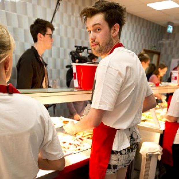 Jack Whitehall serves students breakfast at Newcastle University in his underwear