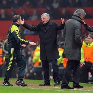 Sir Alex Ferguson, centre, did not attend the post-match press conference