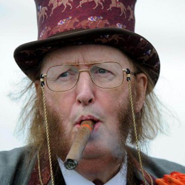 Racing pundit John McCririck is recovering in hospital tonight after falling ill during the first day of the Cheltenham Festival