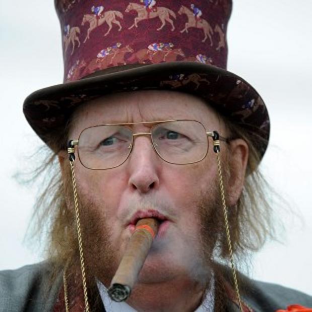 John McCririck is resting in hospital after falling ill