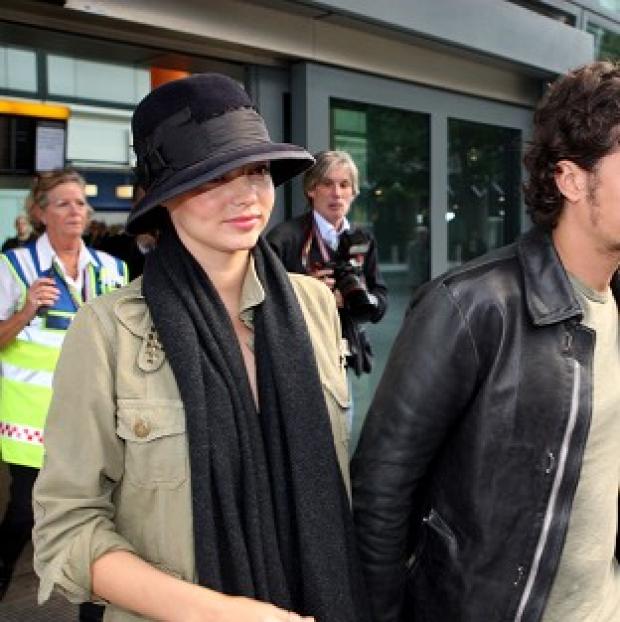 Orlando Bloom has been taking care of model wife Miranda Kerr after her car crash