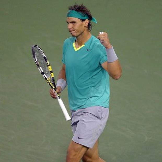 Rafael Nadal, pictured, celebrates his win over Roger Federer (AP)