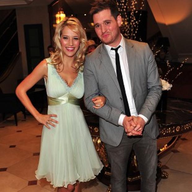Michael Buble and wife Luisana Lopilato are expecting their first child in August