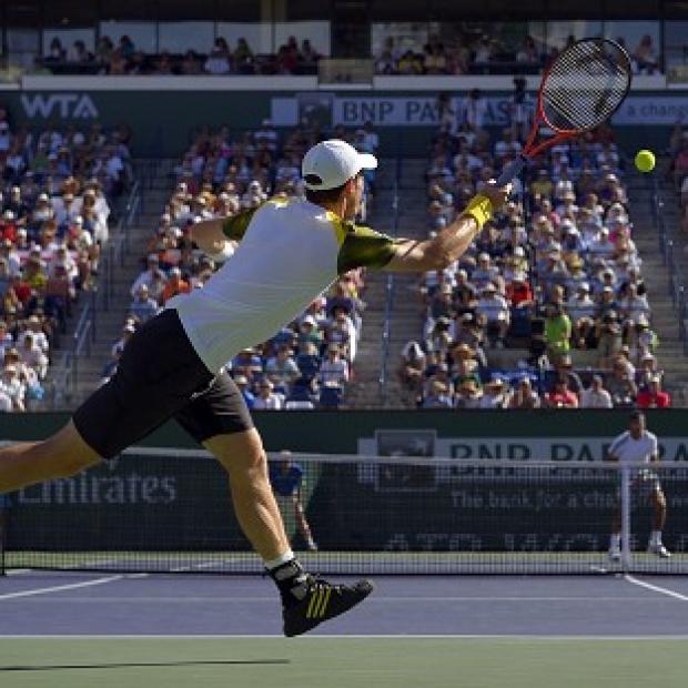 Andy Murray returns a shot to Juan Martin del Potro during their match at the BNP Paribas Open in Indian Wells (AP)