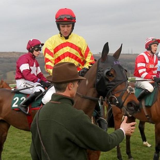 JT McNamara remains in an induced coma after undergoing neck surgery