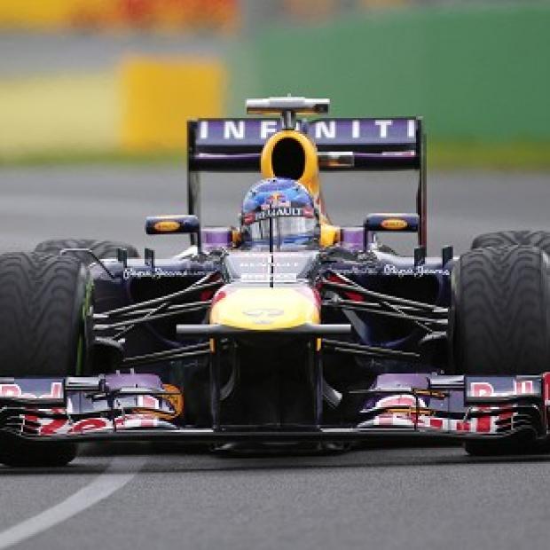 Sebastian Vettel scorched to pole position at Melbourne (AP)