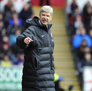 Arsene Wenger's Arsenal became the third side to win at the Liberty Stadium this season