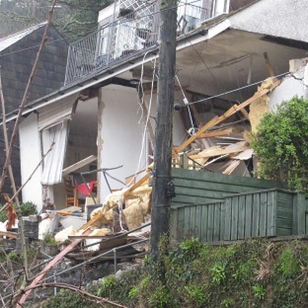 The ''Veronica' flats on Sandplace Road, East Looe, Cornwall, collapsed following torrential rain