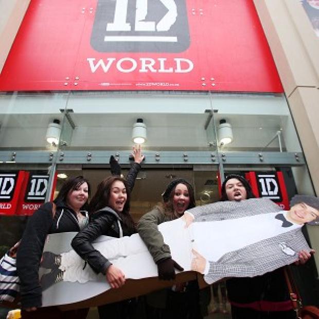 Congleton Guardian: Four fans outside the new 1D World pop-up story in Leeds Congleton Guardian: Four fans outside the new 1D World pop-up story in Leeds
