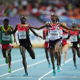 Congleton Guardian: Mo Farah, right, crosses the finish line to secure his second gold medal in Moscow Congleton Guardian: Mo Farah, right, crosses the finish line to secure his second gold medal in Moscow