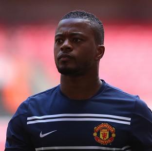 Congleton Guardian: Patrice Evra played his part in Manchester United's victory at Swansea Congleton Guardian: Patrice Evra played his part in Manchester United's victory at Swansea