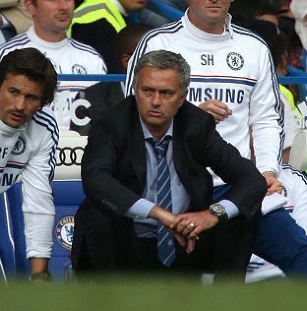 Jose Mourinho, pictured, has not given up hope of signing Wayne Rooney