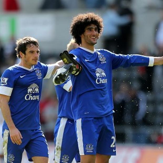 Leighton Baines, left, and Marouane Fellaini are wanted by Manchester United
