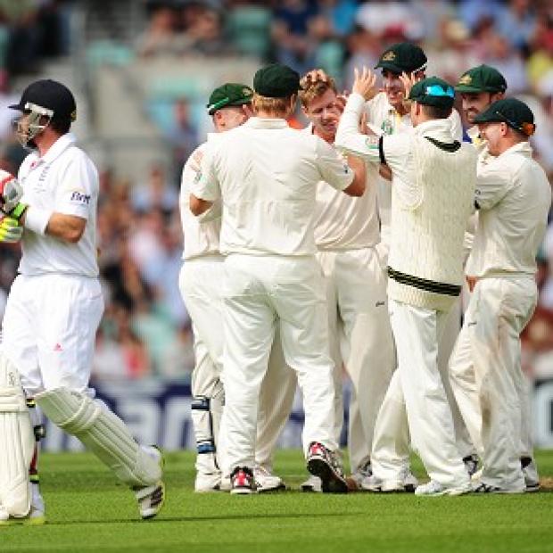 James Faulkner, centre, took four wickets on his Australia Test debut