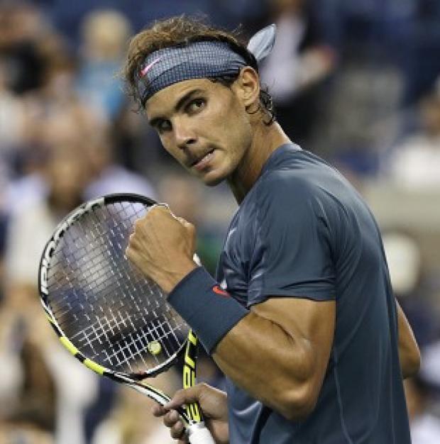 Rafael Nadal dropped just three games to race into the third round of the US Open (AP)