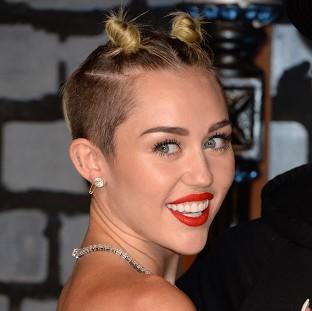 Miley Cyrus has posed for two raunchy new photoshoots
