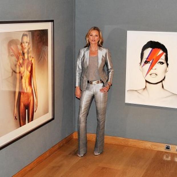 Kate Moss posed for pictures with images of herself