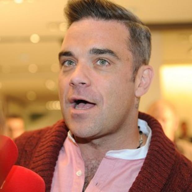 Congleton Guardian: Robbie Williams is releasing a new album Congleton Guardian: Robbie Williams is releasing a new album